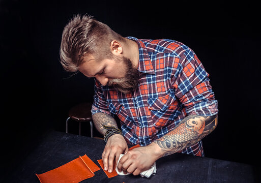 Leather Artisan works with leather