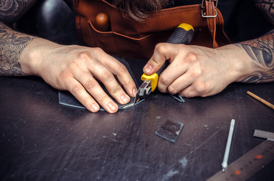 Leather cutter producing leather goods