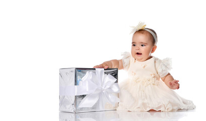 picture of baby boy in diaper with big gift box