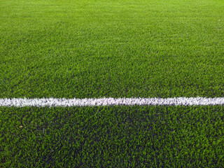 Artificial grass soccer field. Corner kick line of ball and a soccer field , football field , background texture