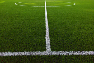 Obraz premium Artificial grass soccer field. Corner kick line of ball and a soccer field , football field , background texture