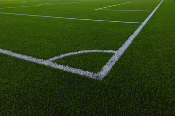 Artificial grass soccer field. Corner kick line of ball and a soccer field , football field , background texture
