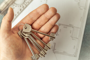 Man holding bunch of keys
