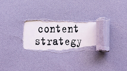 The text Content strategy appears on torn lilac paper against a white background