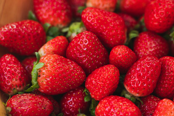 background with delicious and juicy red strawberries