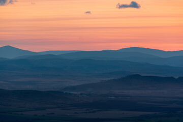 Landscape sunset colors over mountains and hills orange red yellow blue shades natural beauty bulgaria rural