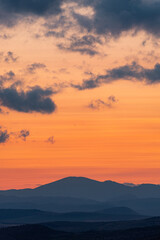 Landscape sunset colors over mountains and hills orange red yellow blue shades natural beauty bulgaria rural