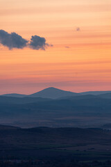 Landscape sunset colors over mountains and hills orange red yellow blue shades natural beauty bulgaria rural