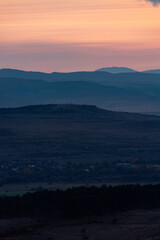 Landscape sunset colors over mountains and hills orange red yellow blue shades natural beauty bulgaria rural