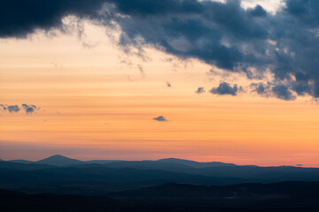 Landscape sunset colors over mountains and hills orange red yellow blue shades natural beauty bulgaria rural
