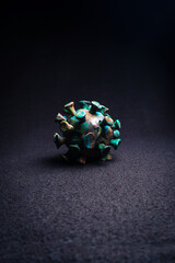 abstract figure from plasticine coronavirus on purple background
