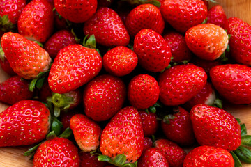 background with delicious and juicy red strawberries