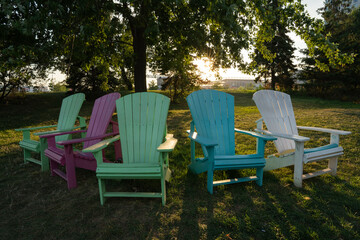 Colorful Chairs at the park with sunset