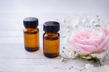 アロマオイルとピンクの薔薇　アロマセラピーイメージ