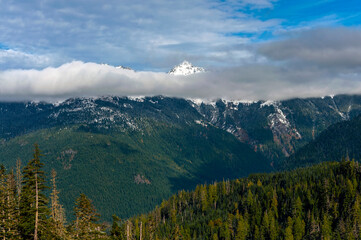 Snow Capped North Cascade Mountain Range. A fresh powdering of snow on the peaks surrounding the Mt. Baker area of western Washington state.