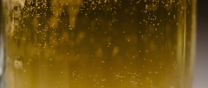 pouring beer into a glass