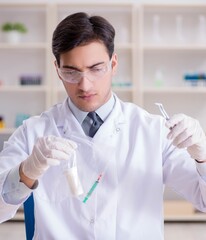 Expert criminologist working in the lab for evidence