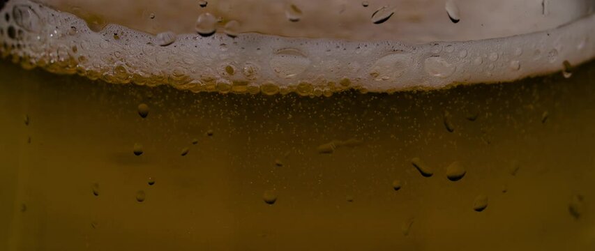 pouring beer into a glass
