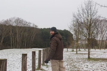 Caucasian man wearing a wooly hat in Parc Natural de Gallecs, Parets del Valles, Barcelona, Spain