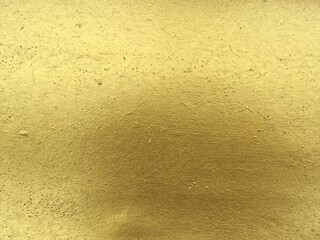 Golden concrete wall texture 