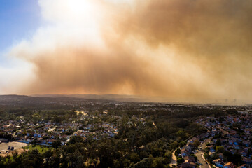 Aerial View of Orange County California Wildfire Smoke Covering Middleclass Neighborhoods During the Silverado Fire_06