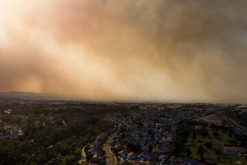 Aerial View of Orange County California Wildfire Smoke Covering Middleclass Neighborhoods During the Silverado Fire_07
