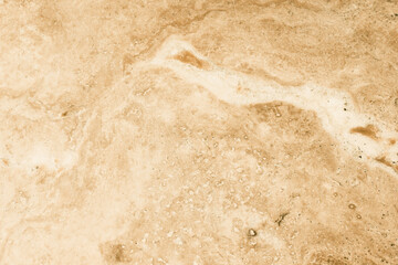 Sanded texture of light beige granite