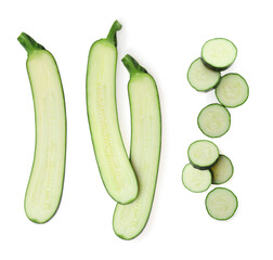 Set of cut fresh zucchinis on white background, top view
