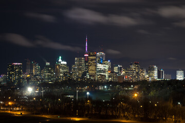 Naklejka na ściany i meble Toronto Cityscape View with Skyscrapers and dense skyline during night time