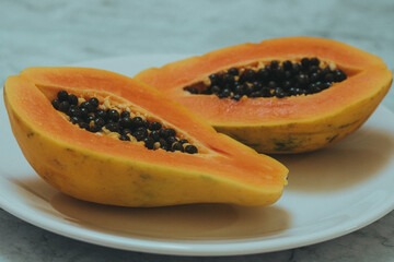 papaya fruit on white background
