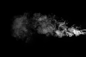 Fototapeta na wymiar White smoke isolated on black background