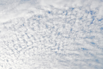 Blue sky background with clouds