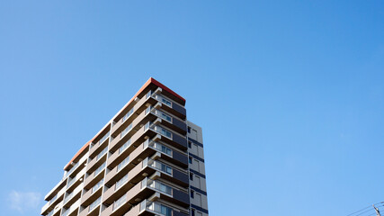 Fototapeta premium マンションと青空