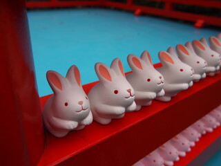 Lovely little white rabbit statues in a shrine, Okazaki Shrine, Kyoto, Japan