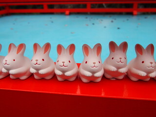 Lovely little white rabbit statues in a shrine, Okazaki Shrine, Kyoto, Japan