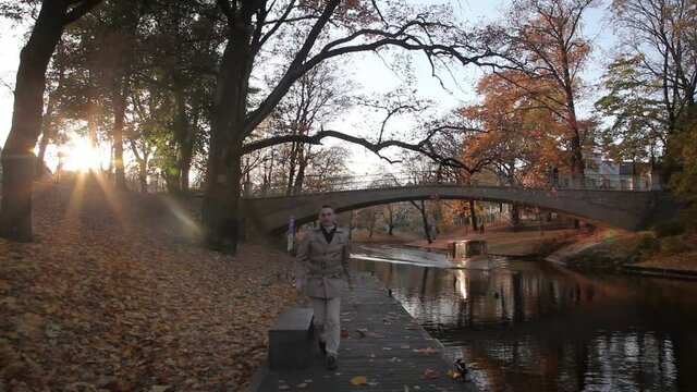  Cinemagraph HD. Congealed world: only bicycle is moving.  City, park , autumn. Riga., Latvia