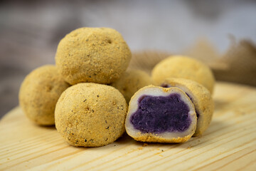 Japanese creative potato shaped dango or dessert with sweet purple potato filling