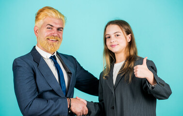 Family business. Acceleration concept. Startup business. Man and little girl business founders. Management team. Future generation replaces. Father and daughter soulmates. In fathers footsteps