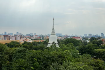 Fotobehang View of white pagoda at Wat Phra Sri Mahathat Woramahawihan temple Bangkok © Kampol