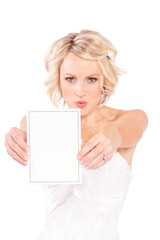 Fototapeta premium A beautiful blonde young bride isolated on white background.