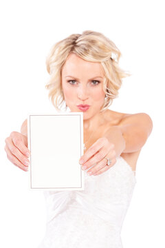 A beautiful blonde young bride isolated on white background.