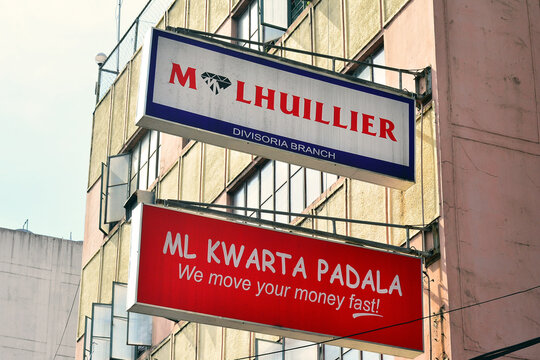 M Lhuillier sign in Manila, Philippines