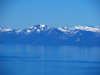 Fototapeta na wymiar Blue Mountains Over Lake