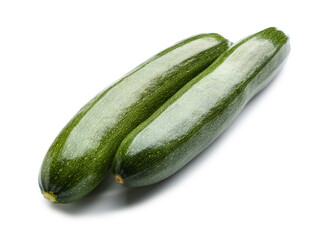 Fresh zucchini squashes on white background