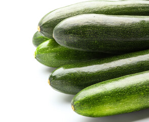Fresh zucchini squashes on white background