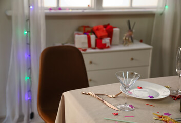 Interior of messy room after New Year party