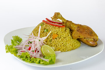 Peruvian food, rice with duck, accompanied by onion, lemon and lettuce. White background.