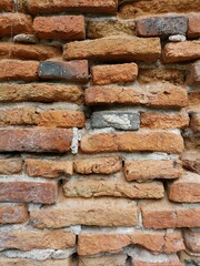 Eroded mortar on brick wall