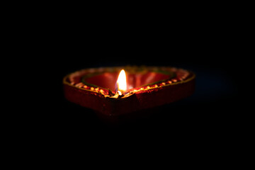 Happy Diwali - Diya lamps lit during diwali celebration