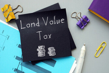 Financial concept meaning Land Value Tax with inscription on the sheet.